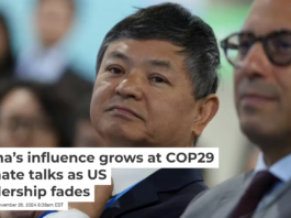 Huang Runqiu, China’s minister of ecology and environment, sits with U.N. climate chief Simon Stiell at COP29 in Baku, Azerbaijan. AP Photo/Peter Dejong
